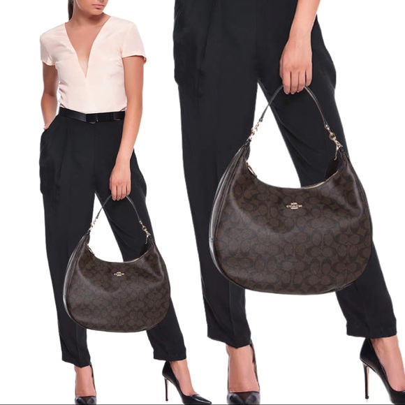 Coach Handbags - Coach Harley Brown/Black Signature Coated Canvas and Leather Hobo Bag